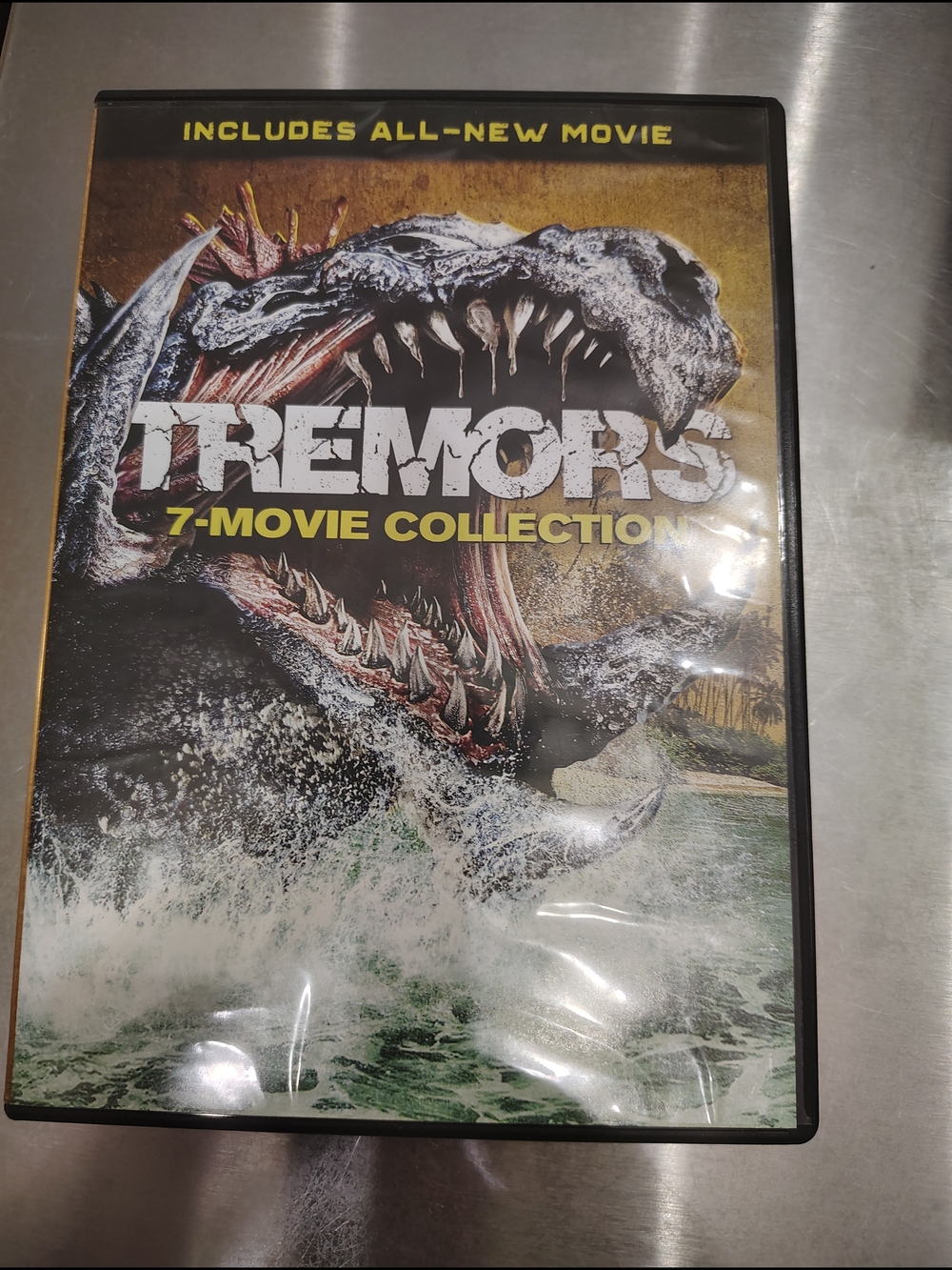 Tremors 7-Movie Collection DVD - Monster Cover Art, Yellow & Black Accents